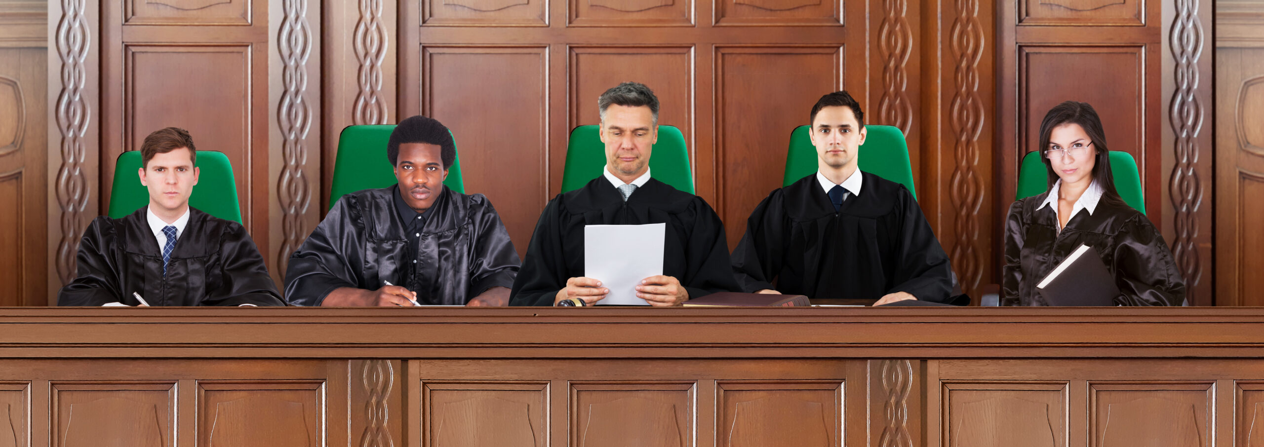 Judges Sitting In A Courtroom During Trial Hearings