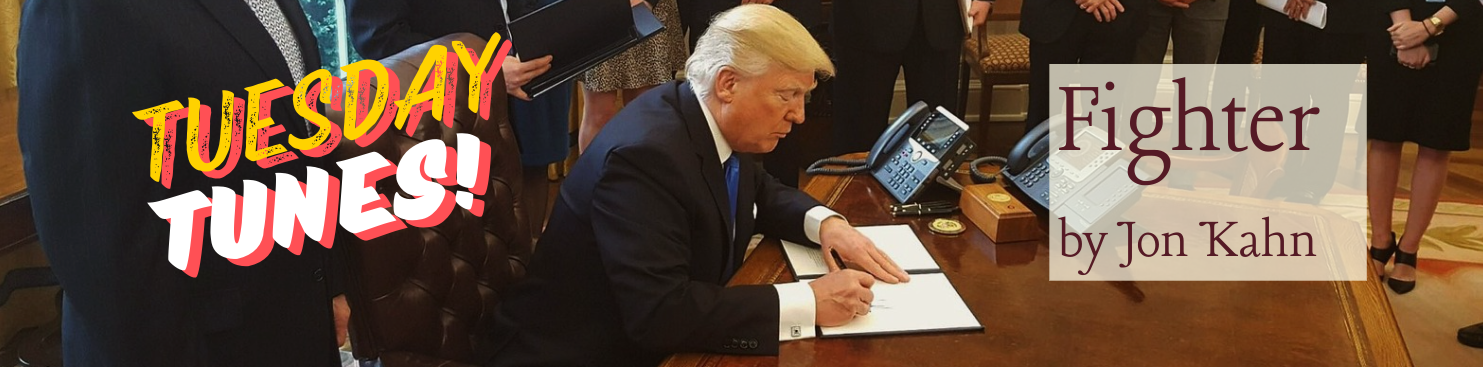 Donald Trump signing a document