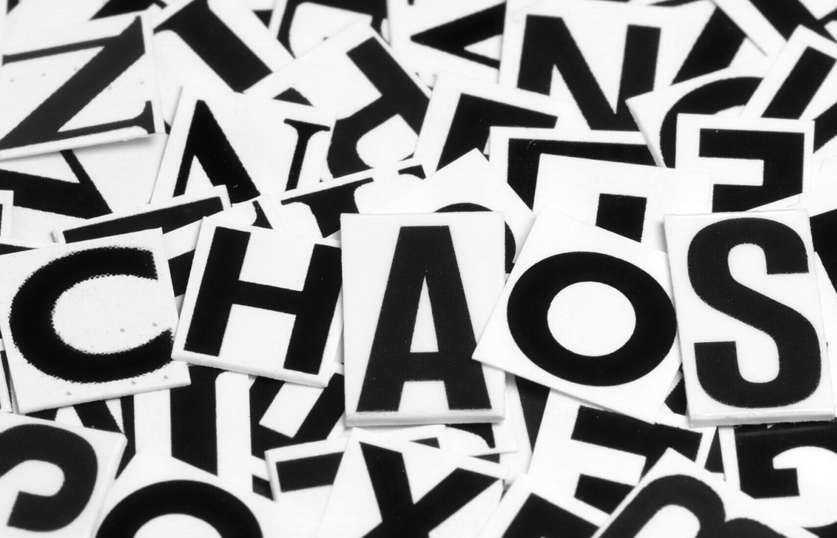 Macro shot of a clipped letters formed the word chaos