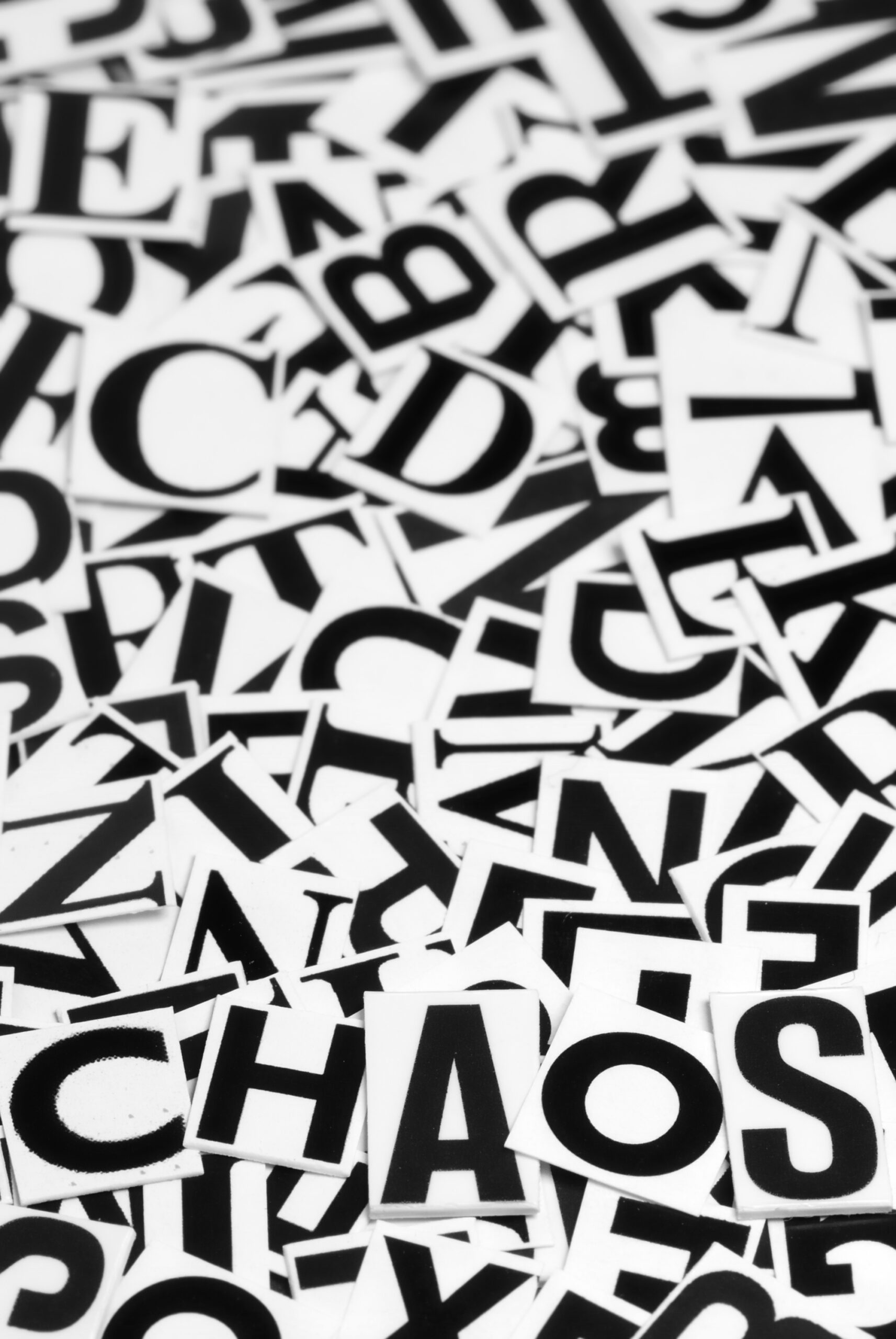 Macro shot of a clipped letters formed the word chaos