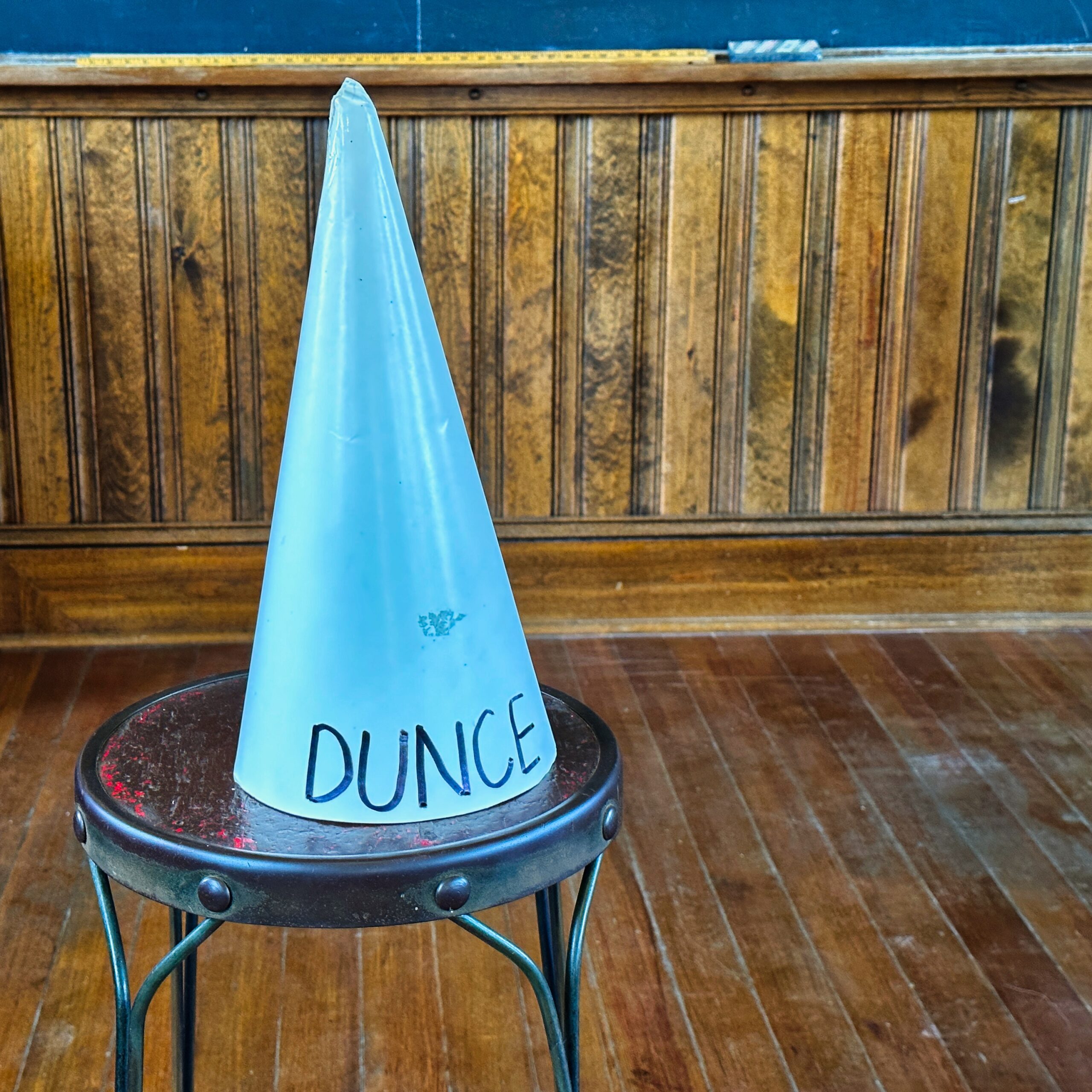 Historical one room school complete with dunce cap. Things have come a long way in the classroom.