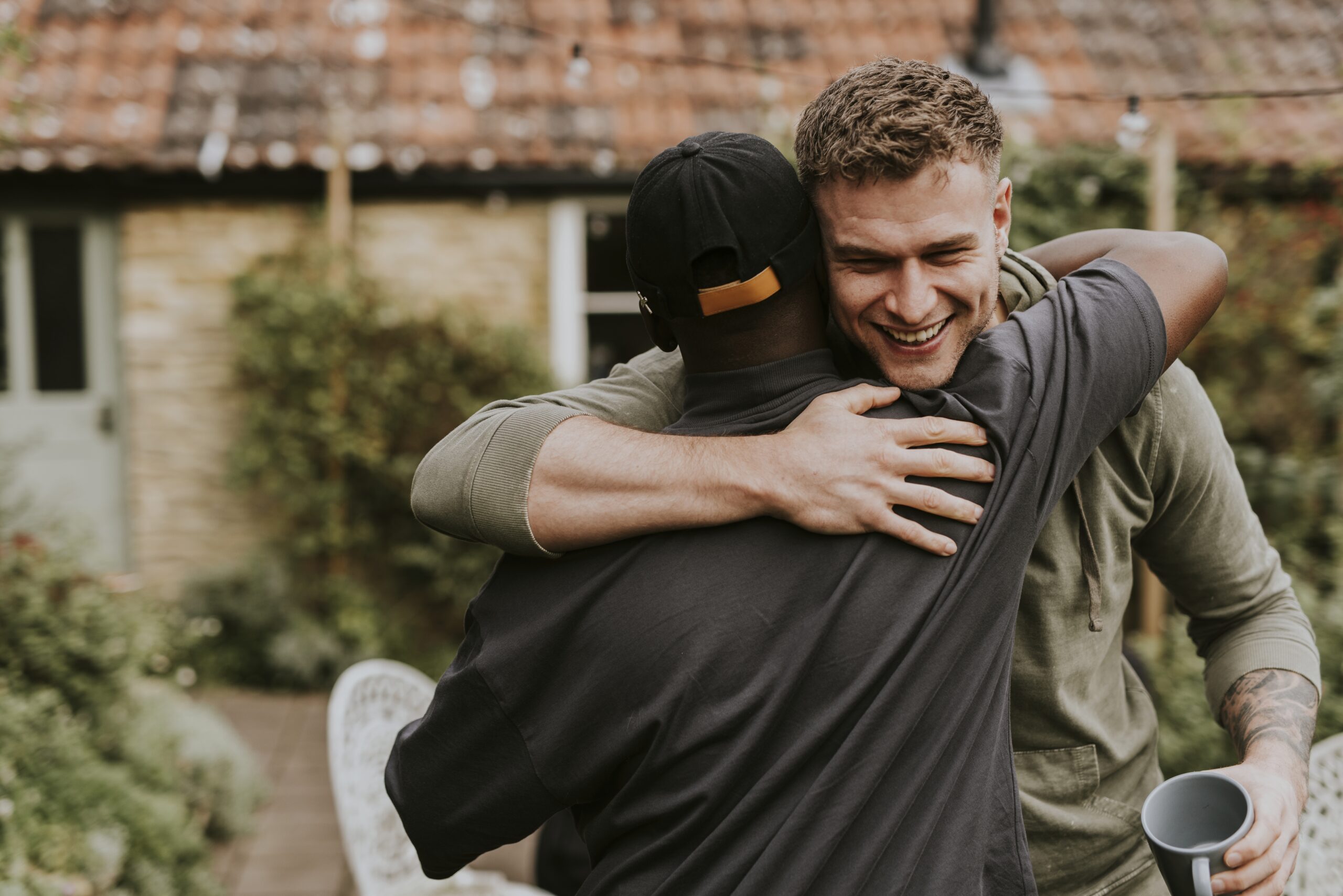 Friends hugging each other at a party