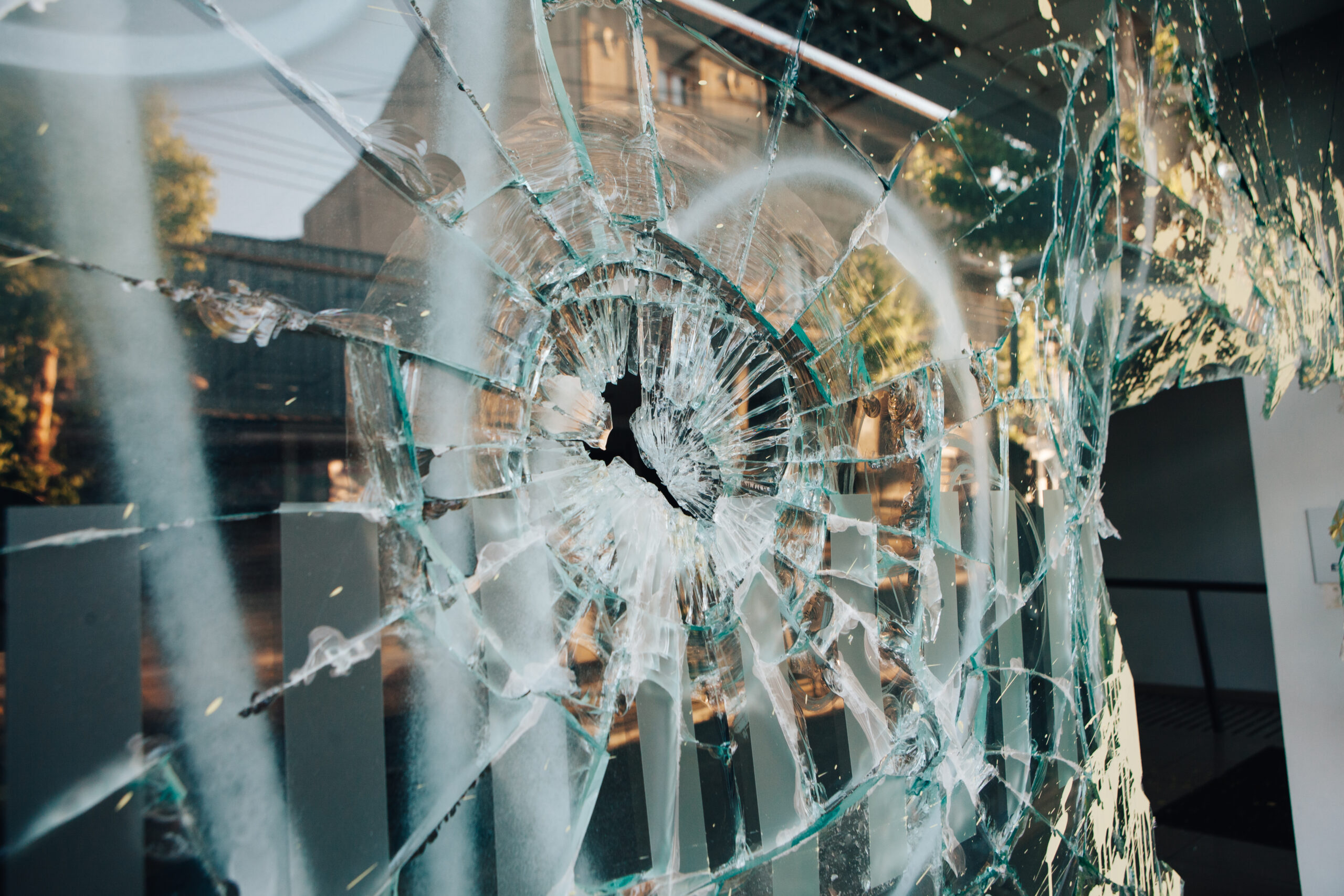 Shop window broken by riots in Chile