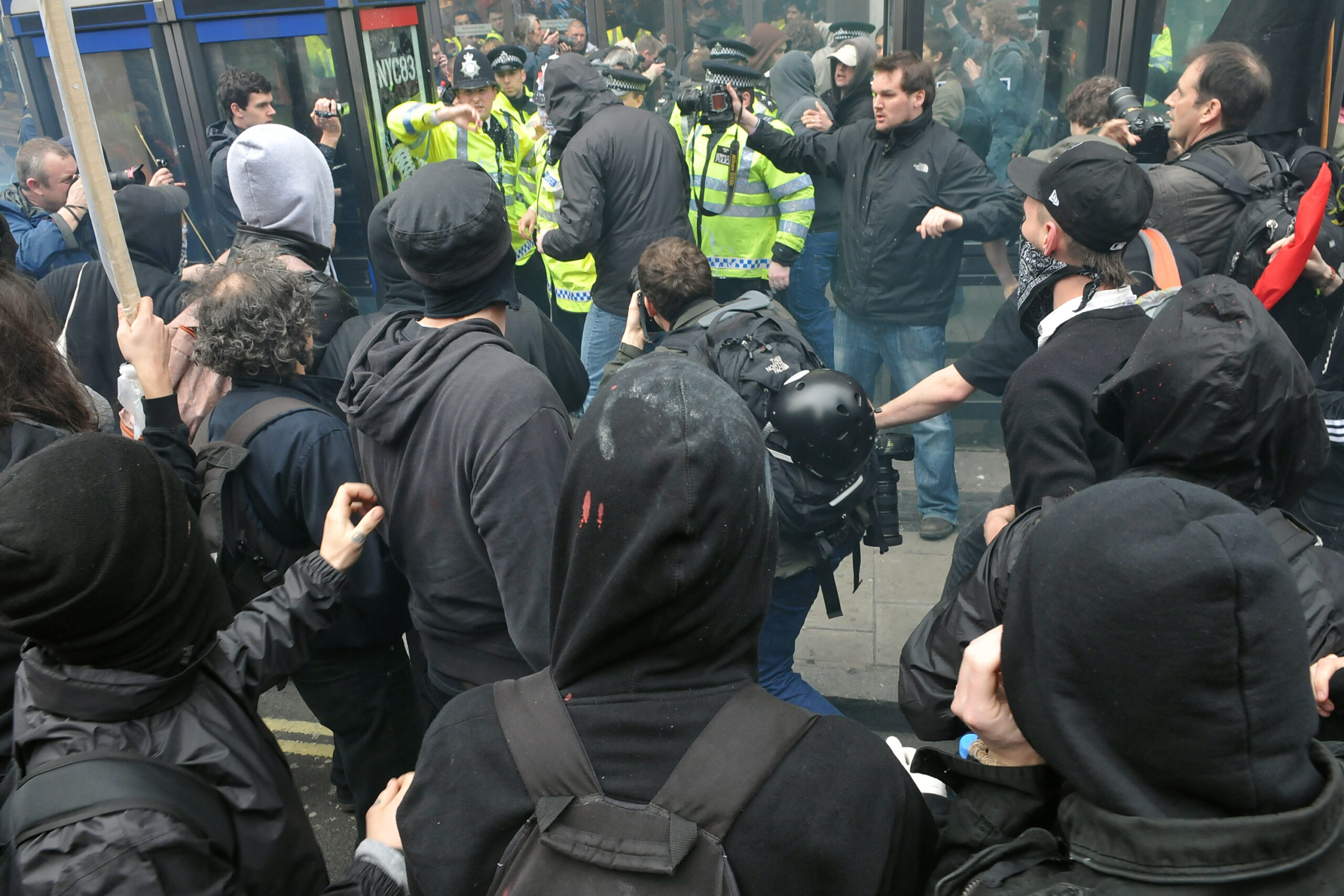 "London, UK - March 26, 2011: A breakaway group of protesters clash with police during a large austerity rally."